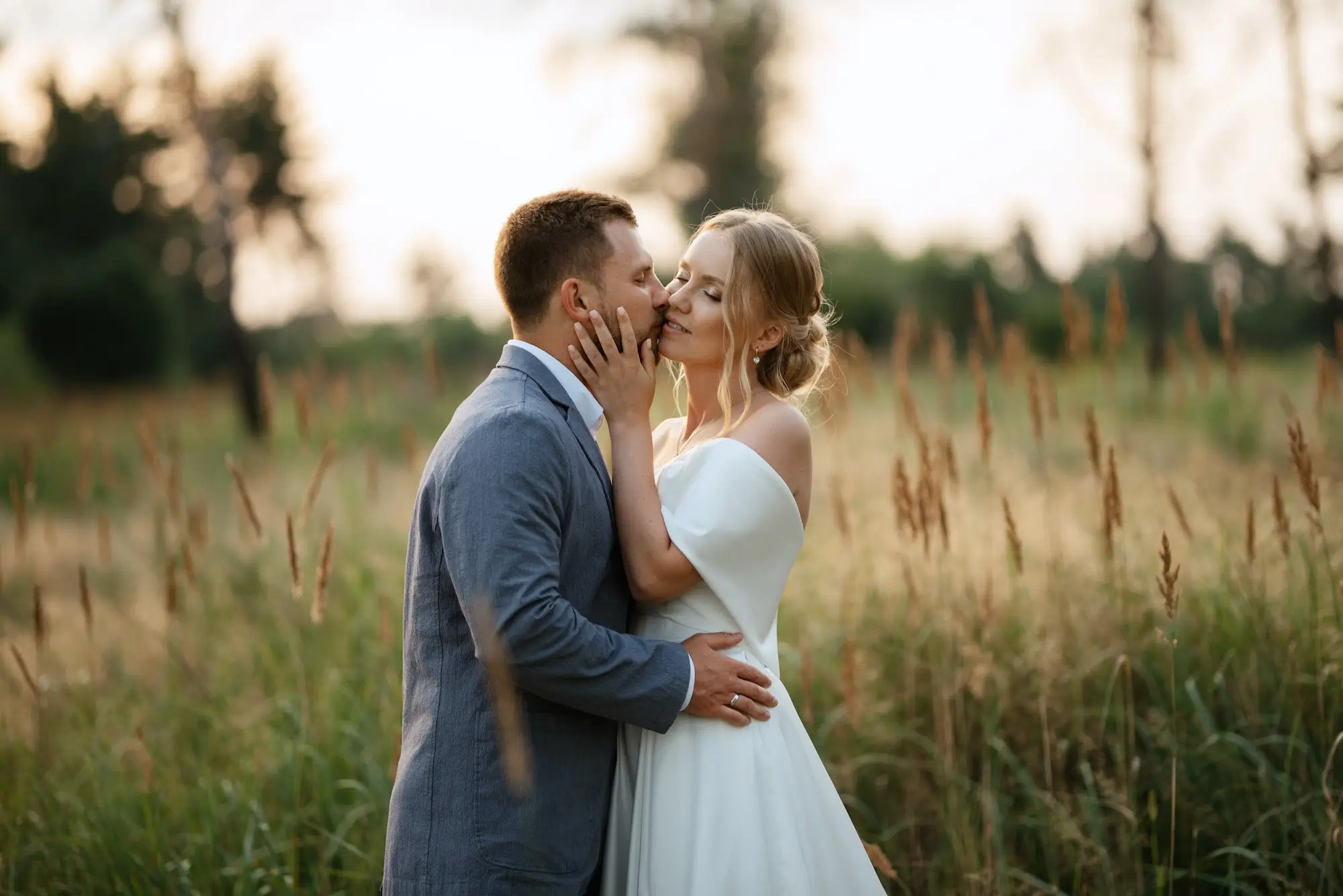 Bride And Groom On In The Woods Kiss