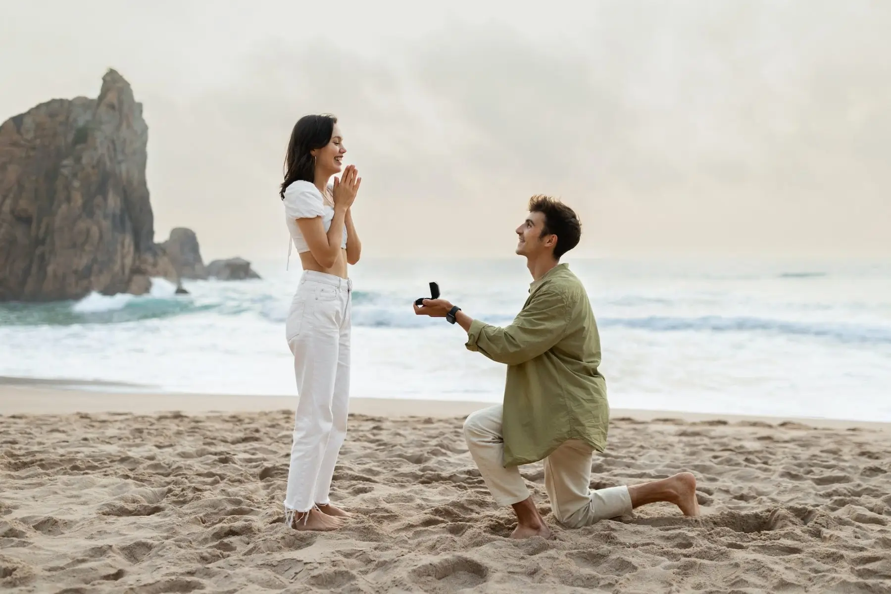Romantic Proposal On The Seashore Loving Young Man With Engagement Ring Making Proposal To Happy Proposal